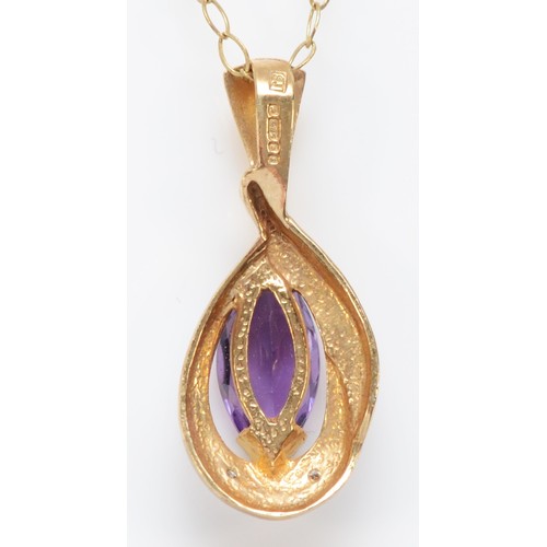 559 - A 9ct gold amethyst and diamond pendant, chain, 1.5gm