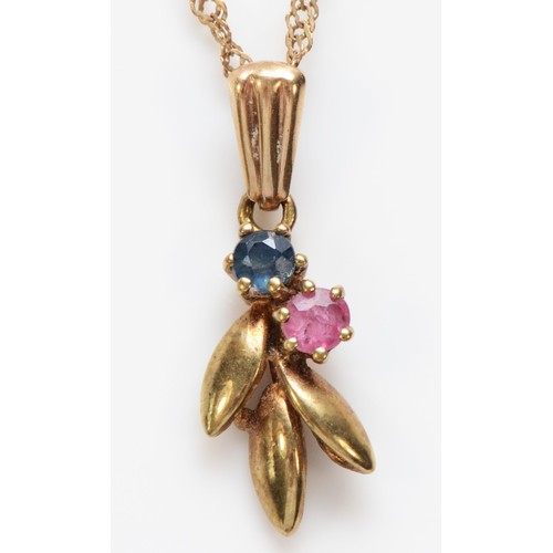 563 - A 9ct gold ruby and sapphire pendant, 1.6gm