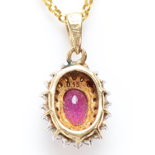 565 - A 9ct gold ruby and diamond pendant, 1.9gm