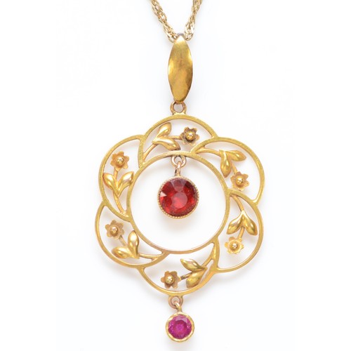 567 - An Edwardian 9ct gold and red paste pendant, stamped 9ct, 41mm overall, chain, 3gm