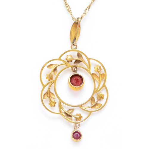 567 - An Edwardian 9ct gold and red paste pendant, stamped 9ct, 41mm overall, chain, 3gm