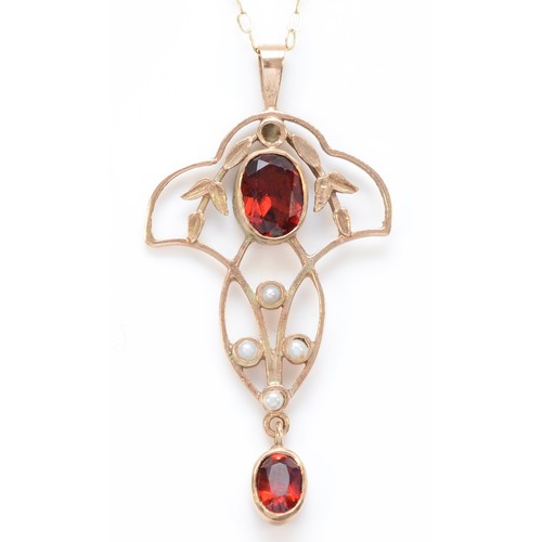 568 - A 9ct gold Edwardian style garnet and half pearl pendant, 38mm overall, 2.3gm