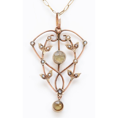 569 - An Edwardian 9ct gold, aquamarine and half pearl pendant, 43mm overall, chain, 3.3gm