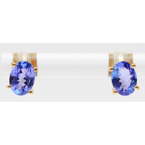 580 - A 9ct gold pair of 8mm tanzanite ear studs, 1.4gm