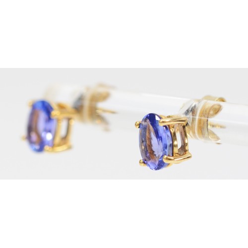 580 - A 9ct gold pair of 8mm tanzanite ear studs, 1.4gm