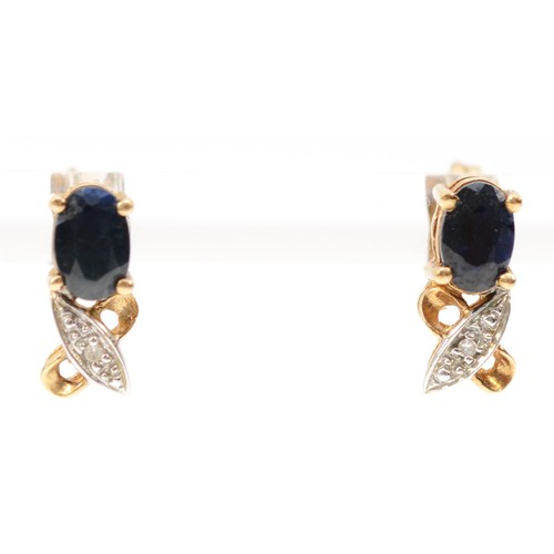 583 - A 9ct gold pair of sapphire and diamond ear studs, 1.4gm