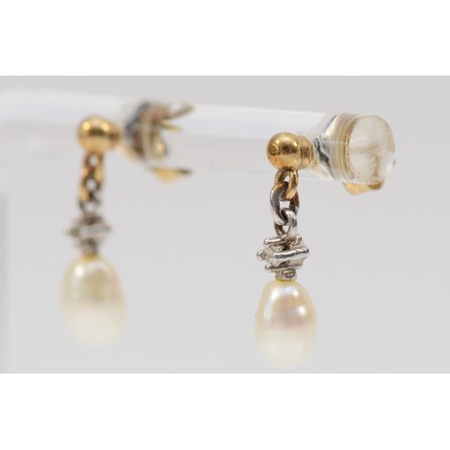 585 - A 9ct gold pair of cultured pearl and diamond ear pendants, 10mm, 1.5gm