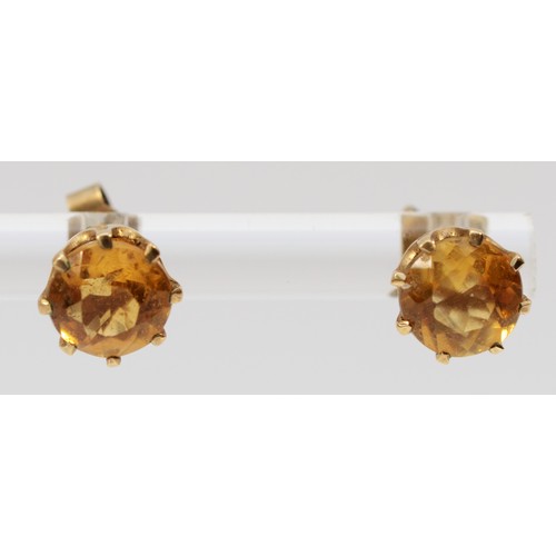 588 - A 9ct gold pair of citrine ear studs, diameter 8mm, 1.6gm