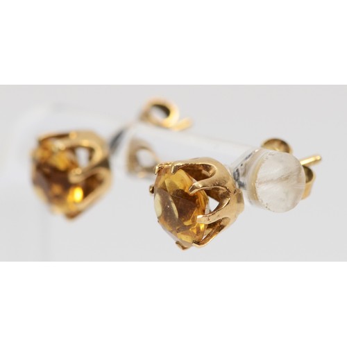 588 - A 9ct gold pair of citrine ear studs, diameter 8mm, 1.6gm