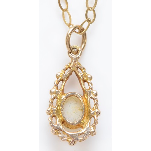 592 - A 9ct gold opal mounted pendant, stone7mm, chain, 2.1gm