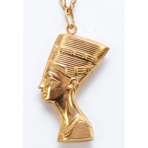 598 - An Egyptian gold Pharaohs head pendant, bearing control marks, 375 9ct gold chain, 5gm