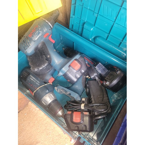 17 - A collection of power tools, to include Bosch cordless drills, Black & Decker circular saw, Red Devi... 