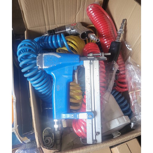 20 - Six industrial pneumatic nail/staple guns, with a large quantity of staples, together with air lines... 