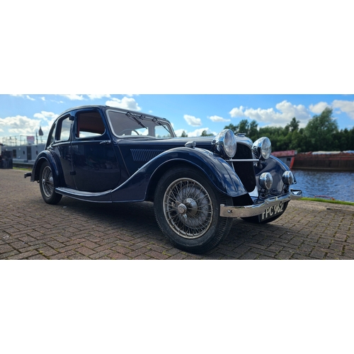 1937 Riley Kestral, 1 1/2lt. Registration number FPC 962. Chassis number 27K6499. Engine number  not found.
Sold with no paperwork, although the car is on SORN and a 2010 tax disc was found in the car.
Produced from 1936 until 1938 when Nuffield took over the company, the Riley 1½-litre, is a range of cars that were available with saloon, touring, and sports/racing coachwork,
The car is powered by a four-cylinder 1,496 cc with one or two Zenith carburettors. It was advanced for its day with twin camshafts mounted high in the engine block, cross flow head on some versions, and Zenith or twin SU carburettors.
The chassis had half-elliptic leaf springs all round and drive was to the rear wheels through either a four-speed preselector or manual gearbox. Girling rod brakes were fitted. 
At launch three body styles were available: the Kestrel 4 light fastback saloon, the Falcon saloon and the Lynx open tourer. In 1936 the Kestrel became a six light, the Falcon was replaced by the Adelphi six light saloon and the Continental touring saloon was introduced. Between 375 and 400 27K models were produced.
FPC is an older restoration that has been stored since 2010 in a dry garage with other vehicles from this deceased estate.