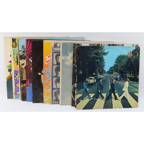 205 - 14 Albums including the Beatles, John and Yoko, Ringo Starr, John Lennon and Wings.
Abbey Road.
Hey ... 