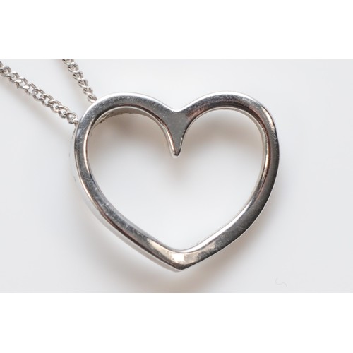 16 - A 9ct white gold diamond heart shaped pendant necklace, 15mm pendant, 2.3g