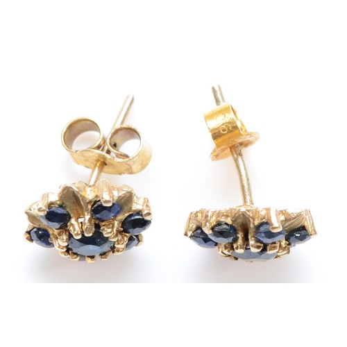 29 - A pair of 9ct gold sapphire cluster earrings with scroll backs, 10mm fronts, 2.1g