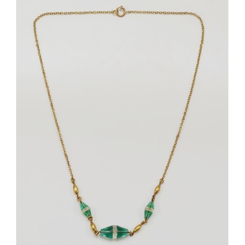 35 - A 9ct gold Edwardian green and clear paste necklace, 4g