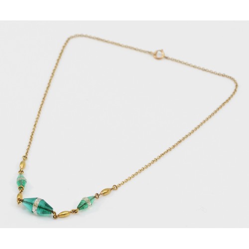 35 - A 9ct gold Edwardian green and clear paste necklace, 4g