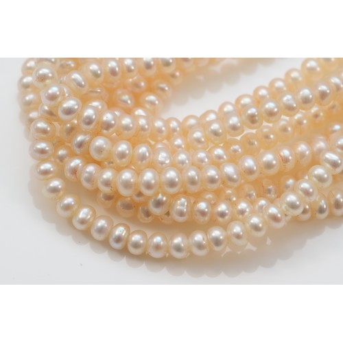 44 - A 9ct gold eight row cultured pearl necklace, 86g