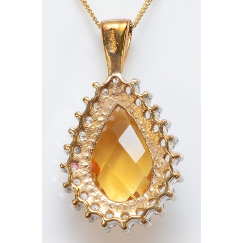 52 - A 9ct gold faceted citrine and cubic zirconia cluster pendant necklace, 20mm pendant, 5.4g