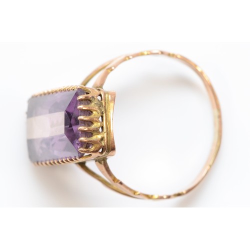 54 - A 9ct gold vintage amethyst single stone ring with split shank, 18mm x 10mm amethyst, R 1/2, 3.7g