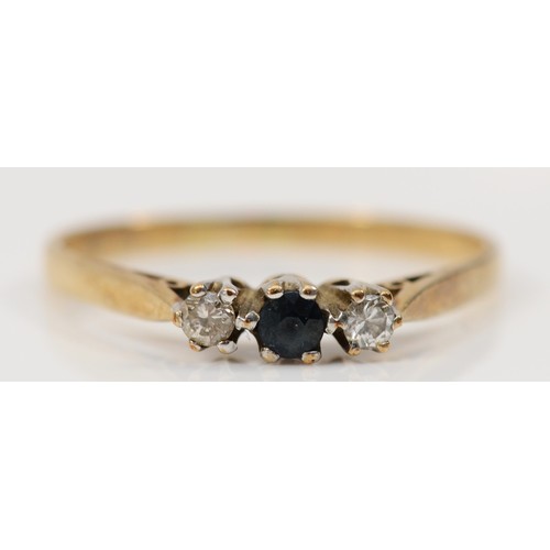 71 - A 9ct gold diamond and sapphire three stone ring, P, 1.3g