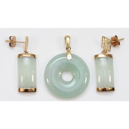 74 - A 9ct gold jade pendant with a pair of 9ct gold jade earrings, pendant is 20mm, earrings are 26mm, 7... 