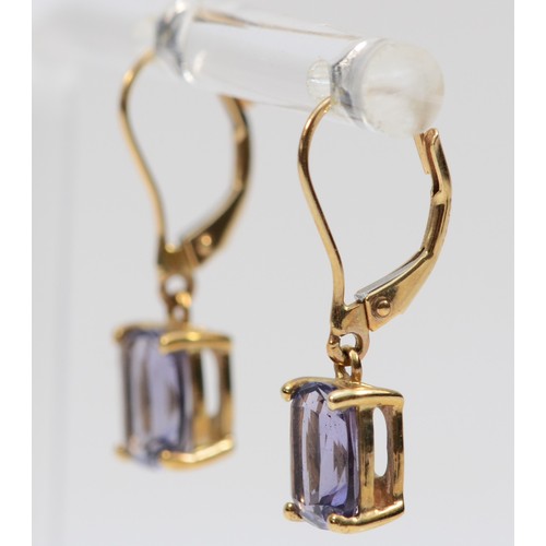 76 - A pair of 9ct gold amethyst drop earrings with hinged back, total drop is 23mm, 2g