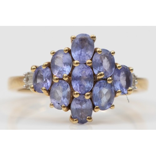 77 - A 9ct gold tanzanite and diamond cluster dress ring, N, 2.3g