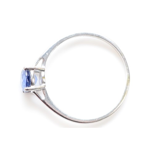 83 - A 9ct white gold round sapphire single stone ring, N 1/2, 1.5g