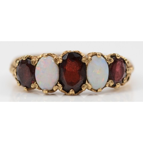 96 - A 9ct gold opal and garnet five stone cluster ring, Q 1/2, 3.9g