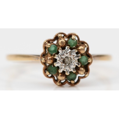 97 - A 9ct gold diamond and emerald cluster ring, claw set, O, 1.7g