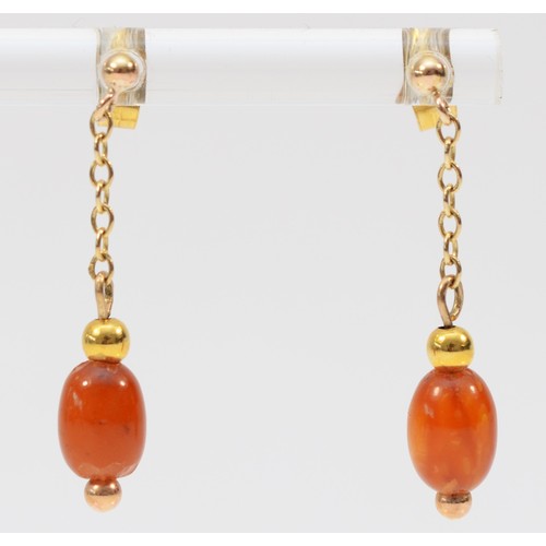 103 - A pair of 9ct gold amber drop earrings with scroll backs, 30mm drop, 1.1g