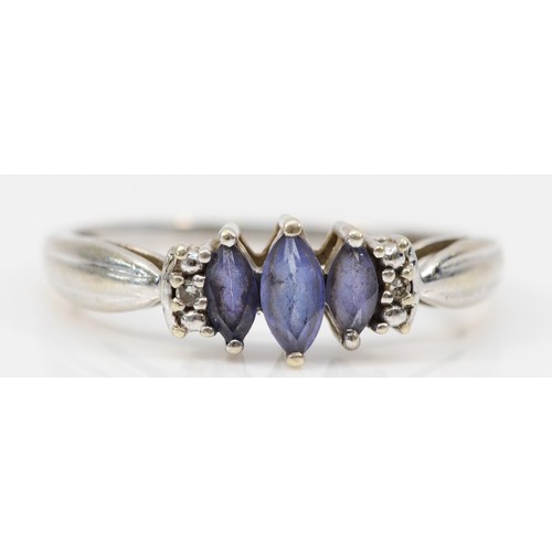 105 - A 9ct gold marquise cut tanzanite and diamond ring, claw set, R 1/2, 2.2g