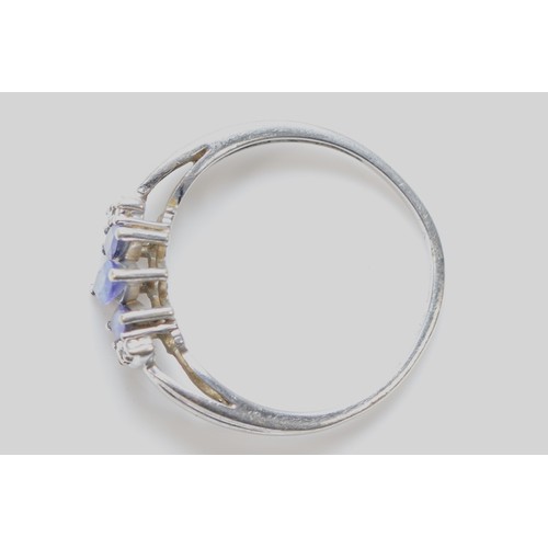 105 - A 9ct gold marquise cut tanzanite and diamond ring, claw set, R 1/2, 2.2g