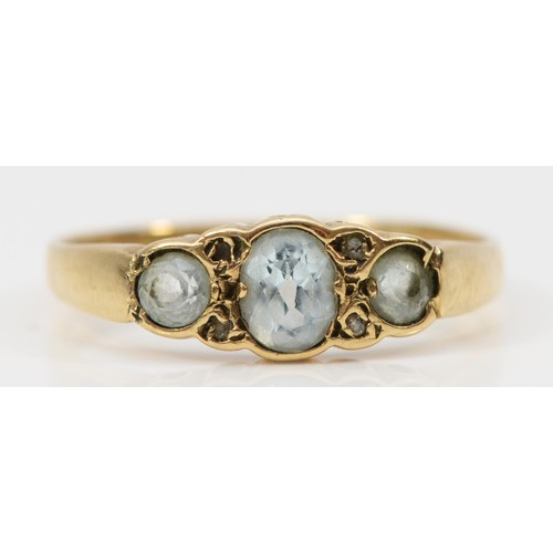 106 - A 9ct gold blue topaz and diamond ring, bezel set, O, 1.8g