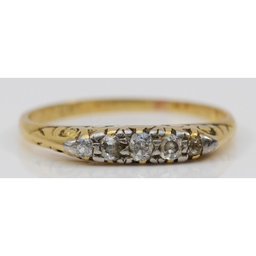 115 - An unmarked 18ct gold antique diamond five stone ring, carved claw set with graduated old cut stones... 