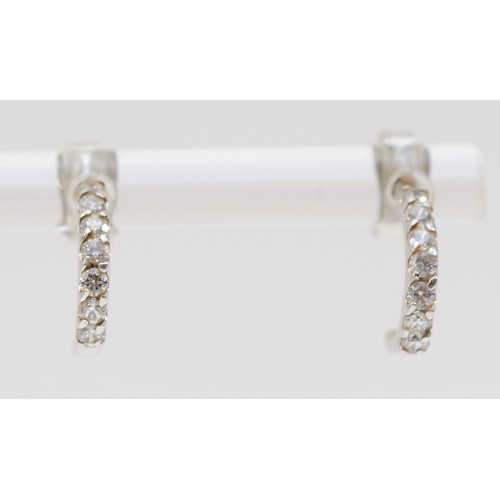 117 - A pair of 18ct white gold half hoop earrings, 1.8g