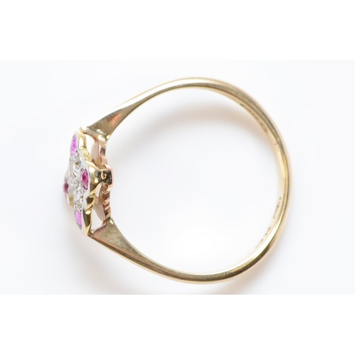 118 - An 18ct gold diamond and red stone ring, O 1/2, 2g