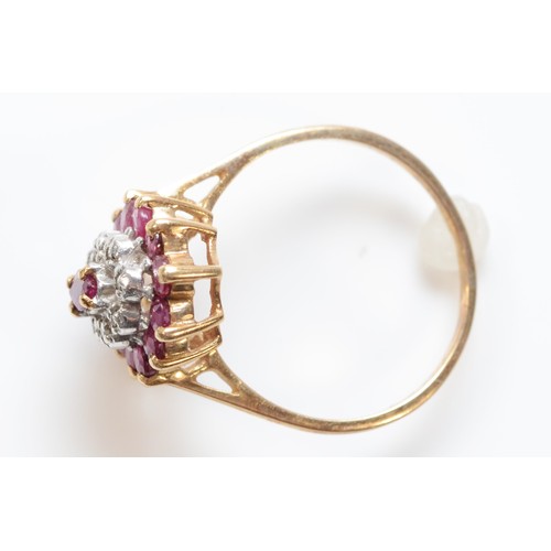 123 - A 9ct gold ruby and diamond cluster ring, M 1/2, 2.3g