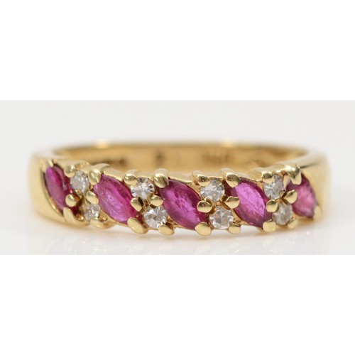 125 - A 9ct gold ruby and diamond half eternity ring, K 1/2, 2.1g