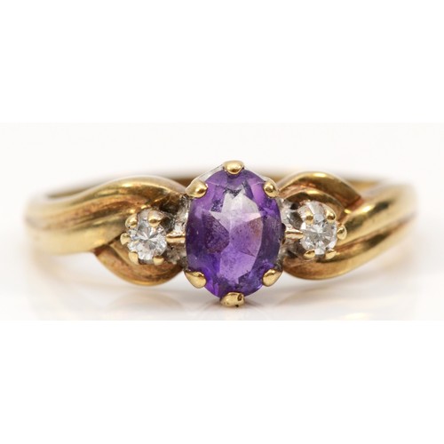 127 - A 9ct gold three stone amethyst and diamond three stone ring, S 1/2, 2.3g