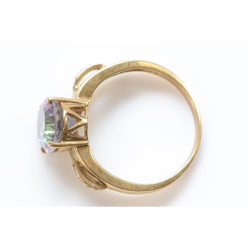 131 - A 9ct gold mystic topaz ring with diamond shoulders, Q, 4.6g