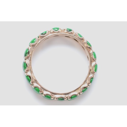 134 - A 14K gold enhanced jadeite eternity ring, J 1/2, 2.7g