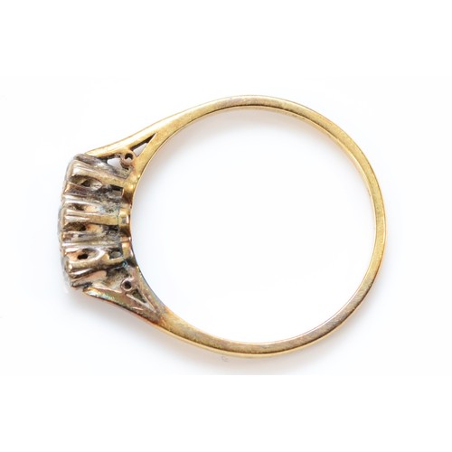 137 - An 18ct gold diamond three stone ring, P 1/2, 2.7g