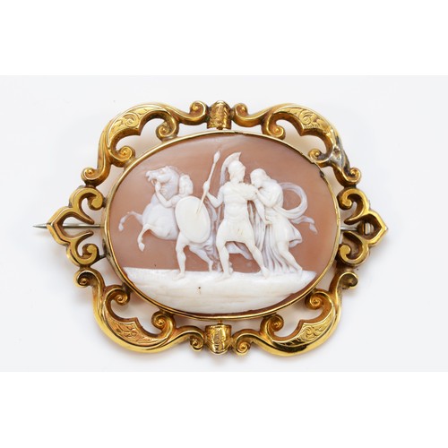 A Victorian gold mounted shell cameo brooch, carved to depict a Roman centurion with a women, shell 43 x 34mm, 14.4gm