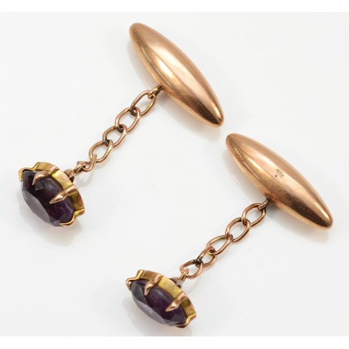 152 - A Victorian pair of unmarked 15ct gold and amethyst cufflinks, torpedoes 22mm, 5.1gm