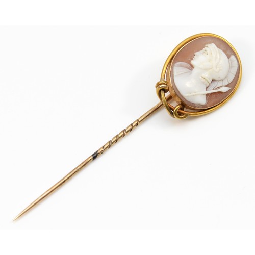 154 - A Victorian 18ct gold mounted shell cameo stickpin, carved to depict a Roman Centurion, 9ct pin, cam... 