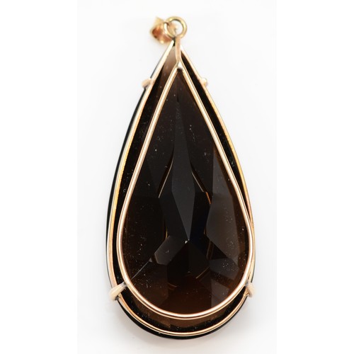 155 - A 9ct gold mounted pear shape smokey quartz pendant, stone 52 x 26mm, 25.9gm